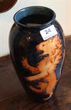 Moorcroft pottery `Lion`s Den` vase.