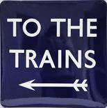 BR(E) enamel Platform Sign `TO THE TRAINS` with left pointing arrow. Measures 24" square with deep