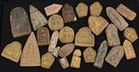 (lot of 26) Himalayan ceramic tsa tsa, of various forms molded with Buddhist figures, largest: 3.
