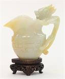 Chinese jadeite libation cup, in the form of an archaistic vessel with a lei-wen pattern, and with