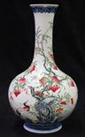 Chinese enameled porcelain vase, with a slender trumpet neck above a globular body, decorated with