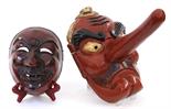 (lot of 2) Japanese lacquered wooden masks, 19th century, reddish brown Dai Tengu (legendary