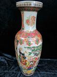 A large Japanese satsuma vase with ornate decoration depicting costumed ladies gathering fruit,