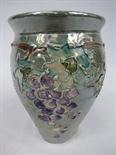 A Lise B Moorcroft Studio pottery vase decorated with grapes and vines, signed and dated 1996.