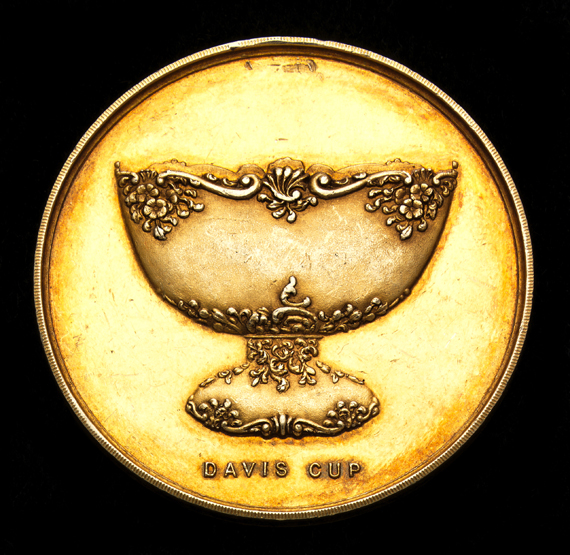 A silver-gilt Davis Cup tennis medal awarded to the British player Frank Riseley for the match v