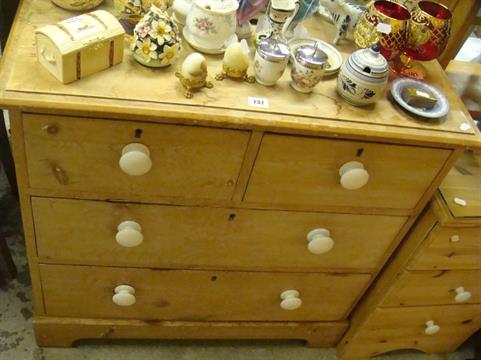 A Victorian Stripped Pine Chest Of Drawers With White Ceramic Knobs
