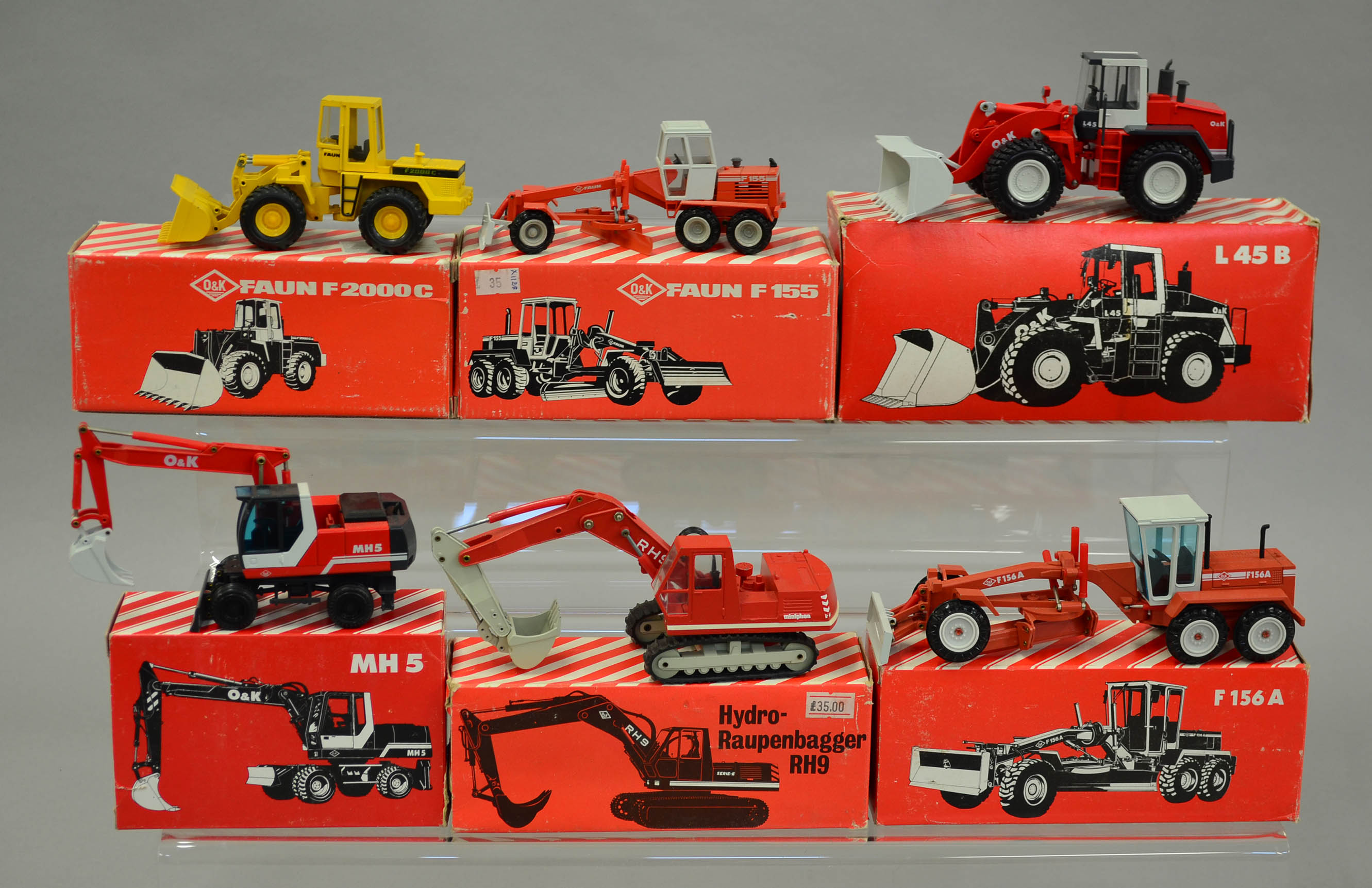 Six diecast model construction vehicles by Conrad and NZG, all O&K Faun F2000C; F156A; L45B; MH5