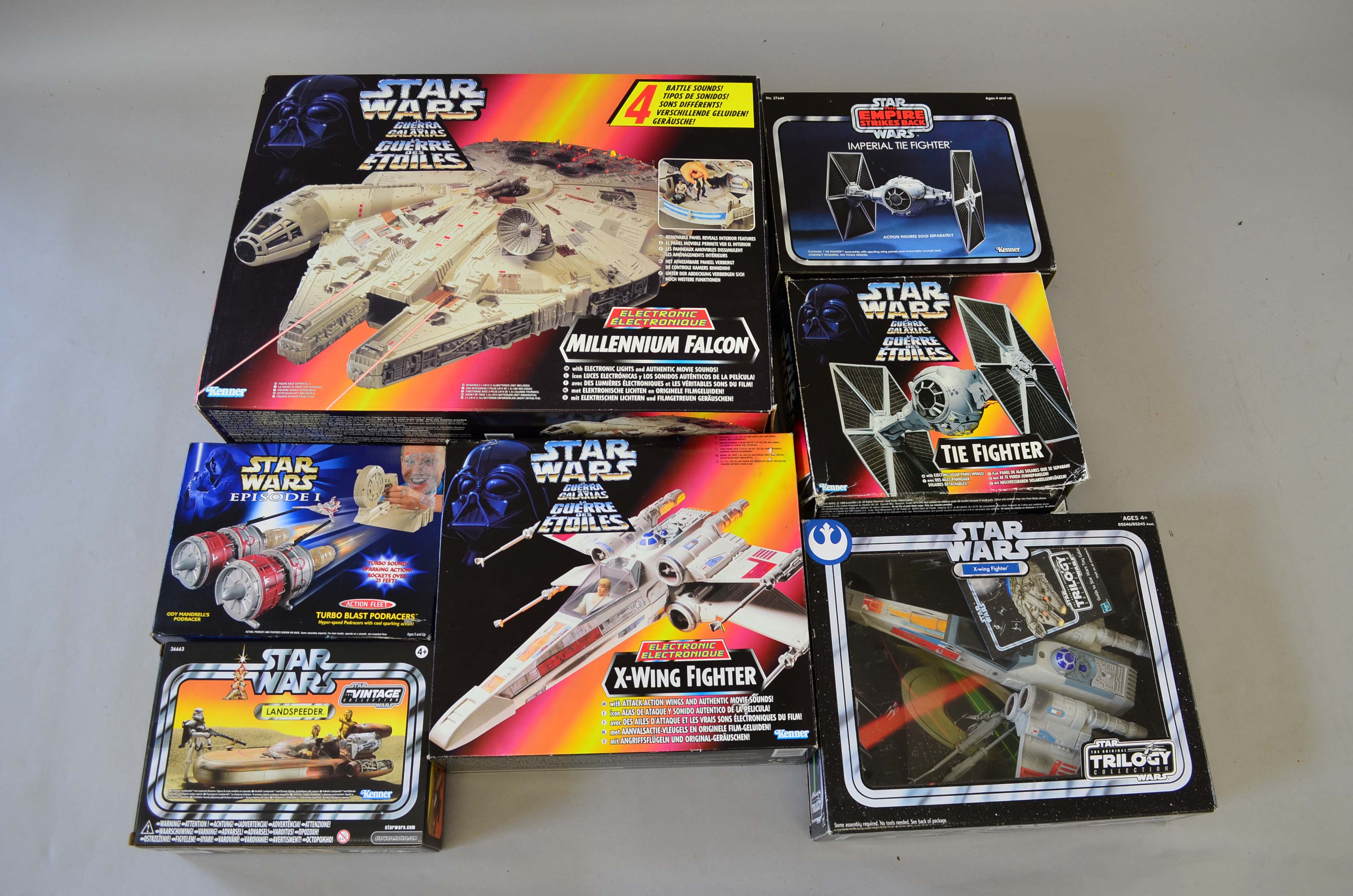 Quantity of Hasbro/Kenner Star Wars toys Electronic Millennium Falcon