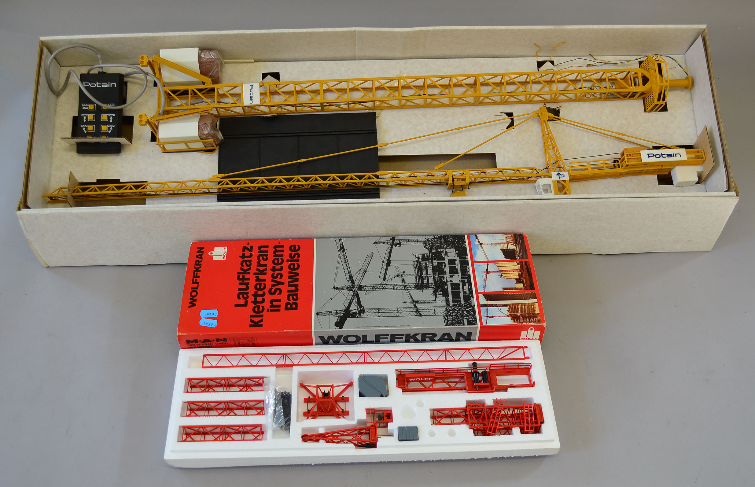 Two crane models Potain 1/47 Topkit E2/23A plastic remotecontrolled