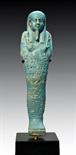 Egyptian Faience Shabti for Ankh-Em-Maat   Egypt, 30th Dynasty, 405-335 BCE.  Tall turquoise ushabti