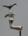 Published Greek Bronze Attachment - Bird Form  Greece, early 7th cent. BCE.  Angled tubular shape