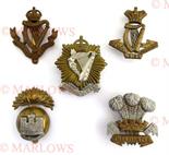 Good Selection of Irish Badges including Vic crown brass Royal Irish Reg ... KC blackened Royal