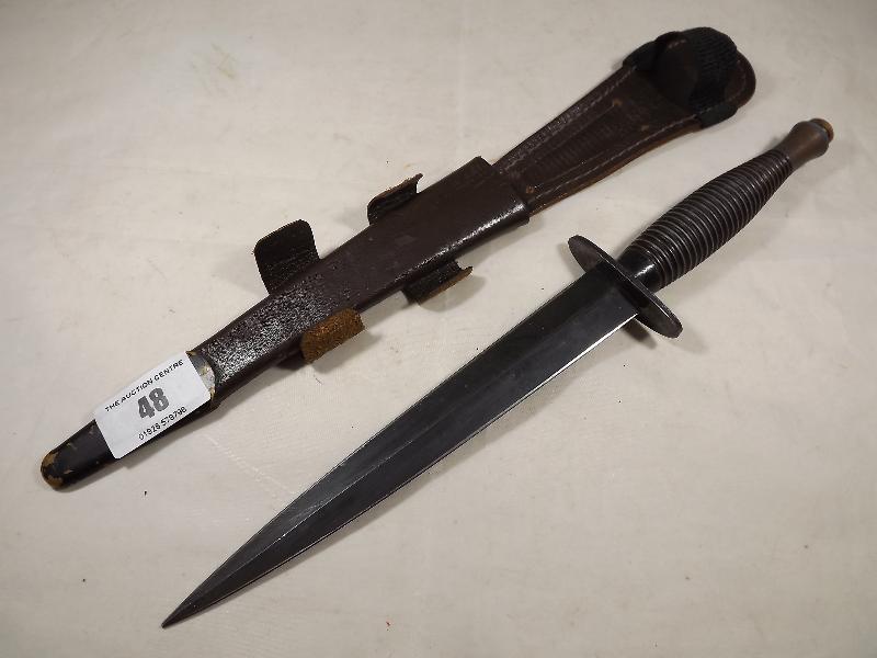 A World War Two (WW2) British Commando SAS FairbairnSykes fighting knife, marked Sheffield, Engl A World War Two (WW2) British Commando SAS FairbairnSykes fighting knife, marked Sheffield, Engl