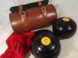 A pair of crown green bowls marked A4915V, 2 full bias, weight 2lbs 6ozs, in brown hard carry case