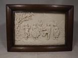 A framed tile depicting dancing figures signed lower right C.F.Becker, framed under glass image size