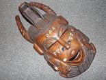 A large good quality wooden tribal mask with inlaid detail 59cm (h)