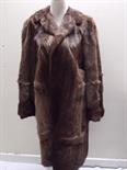 A LADIES VINTAGE FUR COAT, probably calf / cow skin, with curly lamb fur collar, fully lined, hook