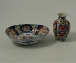 An Oval 19thC small Imari Bowl & an Imari patterned bud Vase (2).