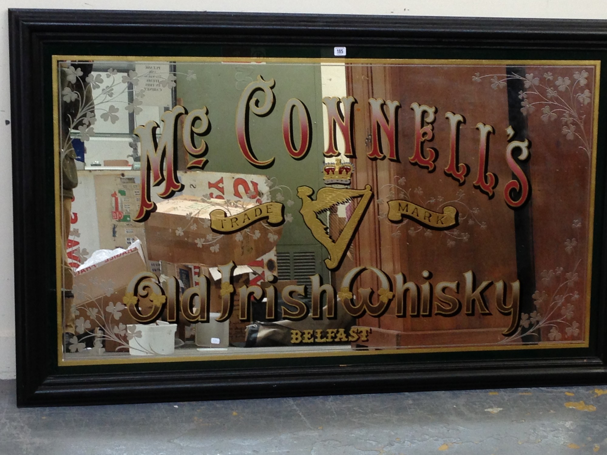 A good, large `McConnells` Old Irish Whisky, Belfast advertising mirror