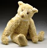 SPECTACULAR AND IMPRESSIVE MID 1920s ERA WHITE STEIFF BEAR WITH BUTTON. This show stopping and