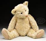 MAGNIFICENT AND IMPRESSIVE LARGE AND EARLY WHITE STEIFF BEAR WITH BUTTON. The crown jewel in any