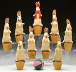 NINE-PIECE STEIFF FELT RABBIT SKITTLE SET ON WOODEN PLINTHS. It is unusual to find an early turn of