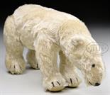 FULLY JOINTED STEIFF POLAR BEAR WITH BUTTON AND UNIQUE BALL-JOINTED NECK FEATURE. A most endearing