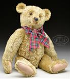 LARGE AND EARLY BLOND STEIFF BEAR WITH BUTTON. This circa 1910 bear is 5-ways jointed and has early