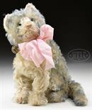 ADORABLE STEIFF FLUFFY CAT WITH MUSIC BOX FEATURE. This most endearing cat is sitting and head