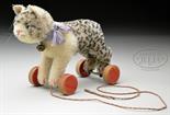 PRECIOUS 1930s ERA STEIFF CAT ON RED WOODEN WHEELS. Cat is standing and unjointed. Made from white