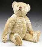 EARLY WHITE STEIFF BEAR WITH BUTTON. Sweet and pensive looking white Steiff bear is jointed 5-ways