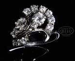 18KT LADY`S DIAMOND RING. Ladies 18kt (tested) white gold ring has14 round brilliant cut diamonds in