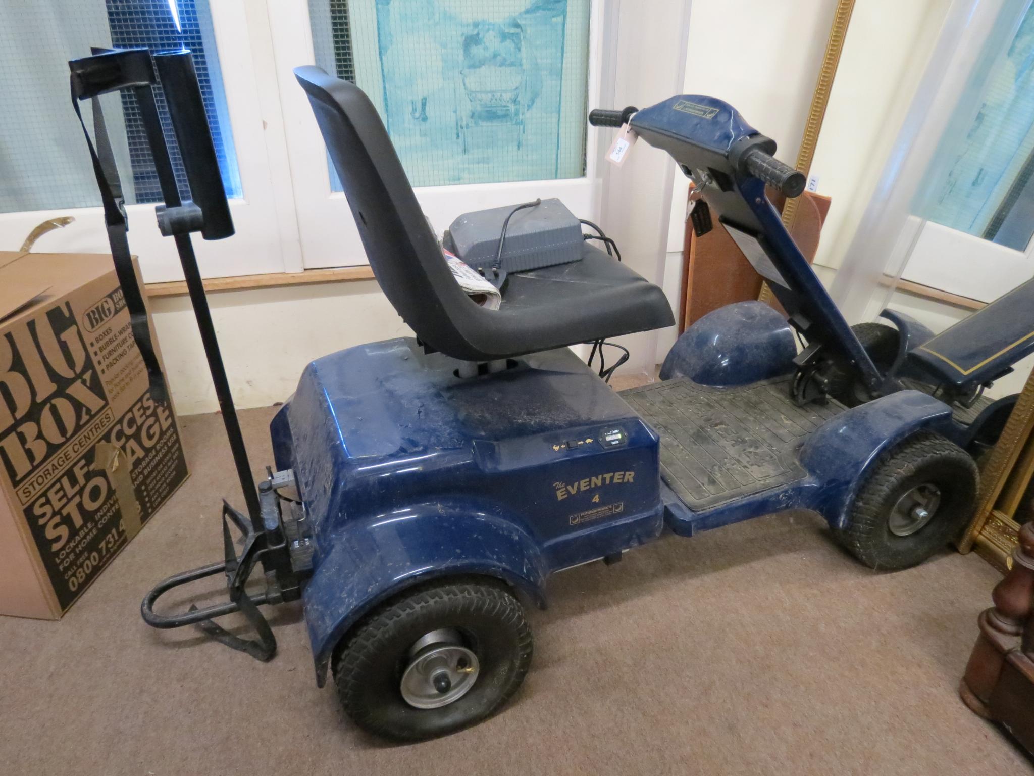 A Patterson Eventer Golf 4 player`s electric buggy, with key, battery