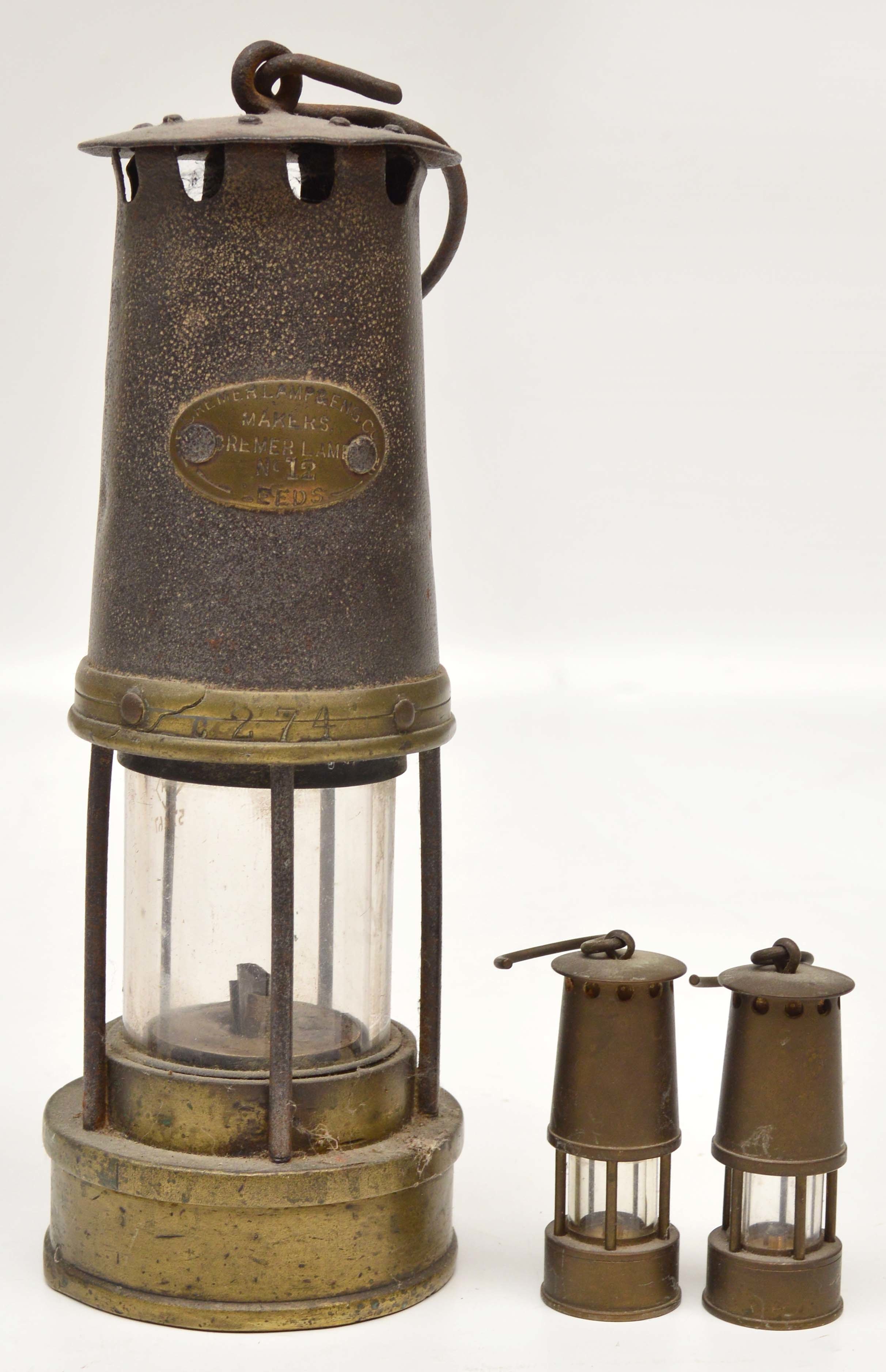 A miners lamp Cremer Lamp & Ing Co. no12, with two miniature miners