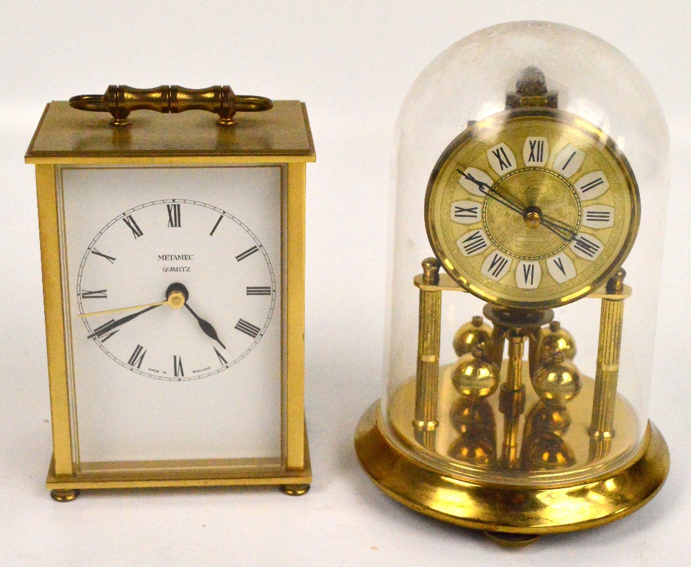 A Metamec quartz battery operated carriage clock and a small