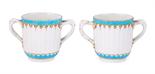 A PAIR OF WORCESTER CHOCOLATE CUPS, 1770S of fluted form with entwined handles and foliate