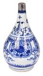 A CHINESE PORCELAIN BLUE AND WHITE BOTTLE VASE, KANGXI (1662-1722) the pear-shaped body rising