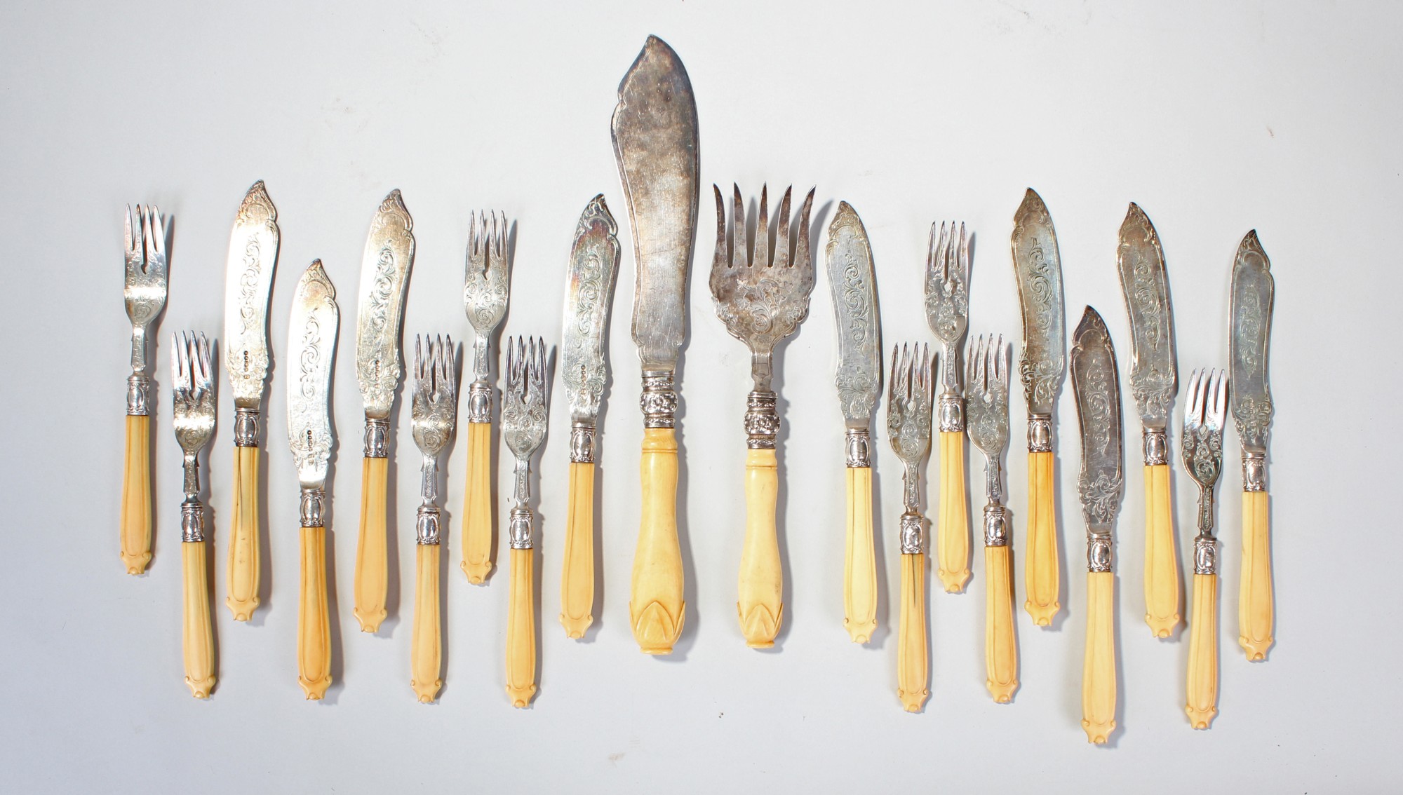 Set of Victorian silver plated and ivory handled fish cutlery