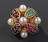 Yellow metal pearl and multi-gemstone set ring, the ring set with five pearls, and pink, red and