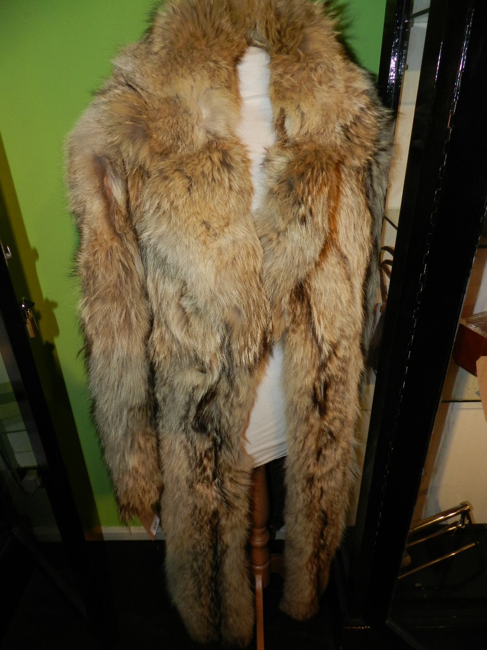 A retro 1960/70s `Huggy Bear,` wolf fur coat.