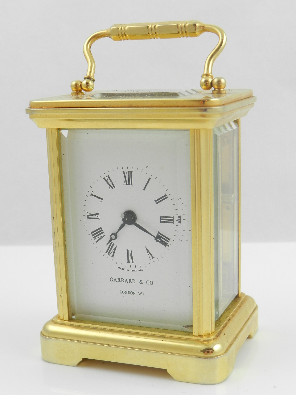 A Garrard & Co, London miniature gilt brass and glass cased carriage