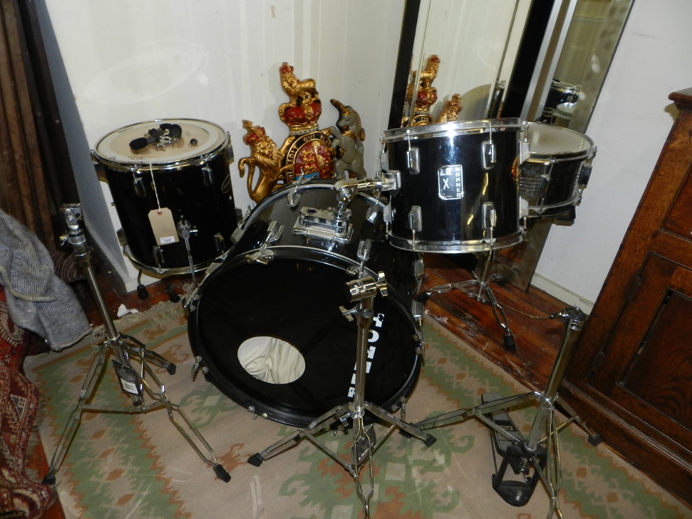 A Honer part drum kit, comprising bass drum, floor tom, snare stand