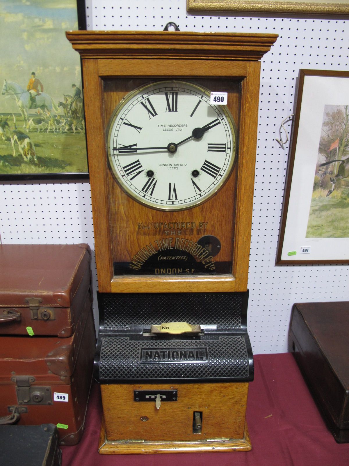 A National Time Recorder Co Ltd ClockingIn Clock, oak cased, white