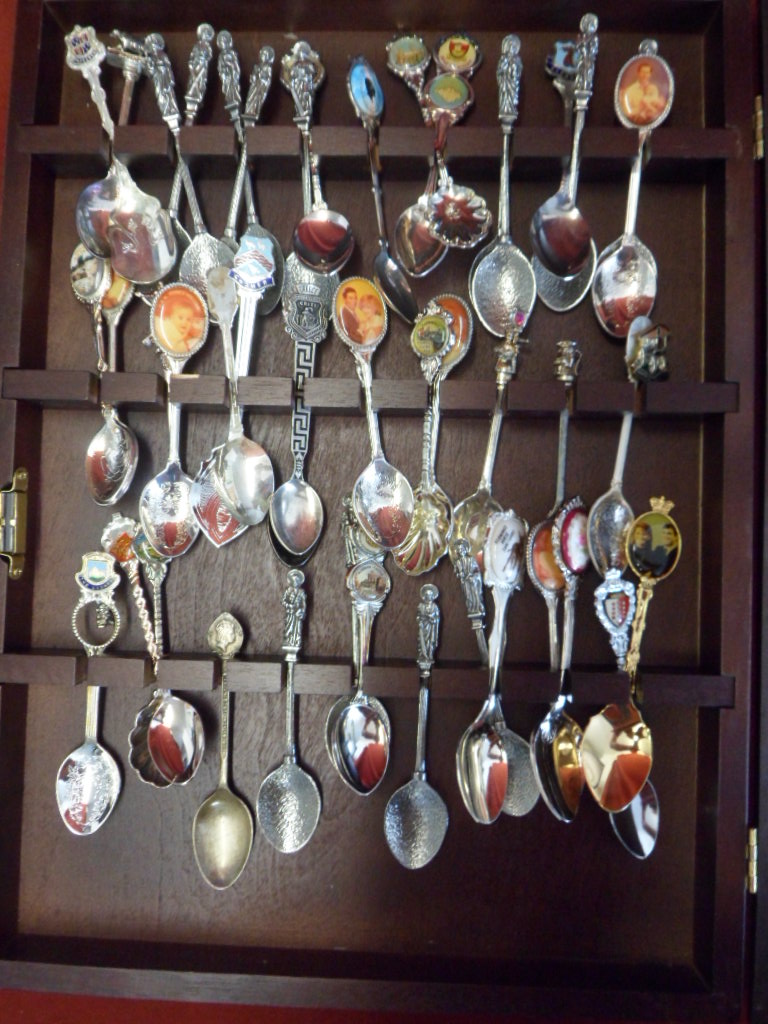 Teaspoon collection and display frame A collection of teasspoons with