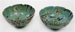 A PAIR OF ATTRACTIVE CHINESE BOWLS, 
tourquoise ground with colourful flowers and butterflies,