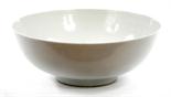 A CHINESE PLAIN WHITE MONOCHROME BOWL, 
with blue seal mark to base, 8.5in (21.5cm)d. (1)