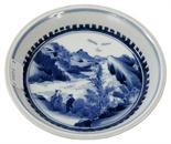 A CHINESE BLUE AND WHITE DISH, 
decorated with figures in a river landscape, six character mark to