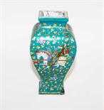 A VERY UNUSUAL CHINESE VASE,
of square baluster form, with floral sprays, winged horses, and