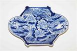 An unusual Japanese blue and white porcelain dish,
decorated with flowers and fans, 12.5" (32cm).