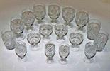 A SET OF SIX WATERFORD CRYSTAL STEMMED TUMBLERS, three other cutglass tumblers, four cutglass ports,